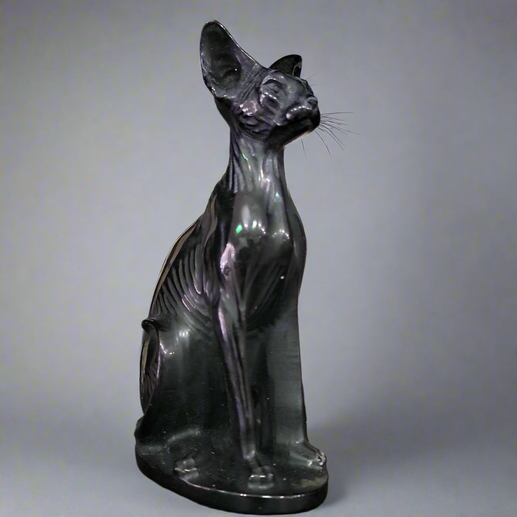 Hand-carved 6-inch Egyptian Hairless Cat Bast statue featuring sleek, hairless lines and expressive detail, inspired by the goddess Bastet, displayed on a white background.