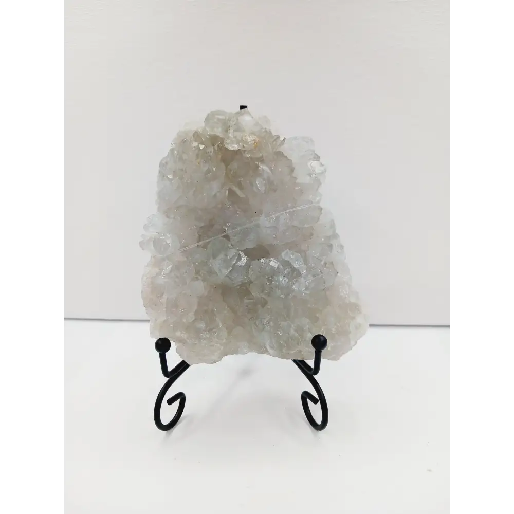 Fine glittery amethyst specimen, featuring sparkling purple points and a shimmering surface, displayed on a white background.