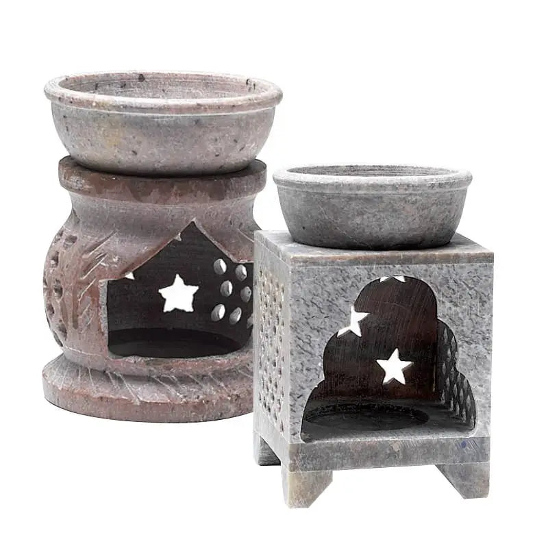 Soapstone oil burner standing 3 to 3.5 inches tall, available in assorted styles and colors, displayed on a white background. Perfect for diffusing essential oils and adding a touch of elegance to any decor.