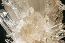 clear crystal stone on black surface
