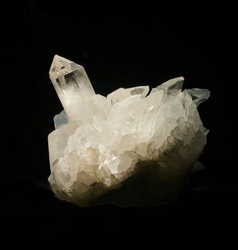 a white crystal with a black background
