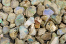 a close up of a pile of opalite rocks