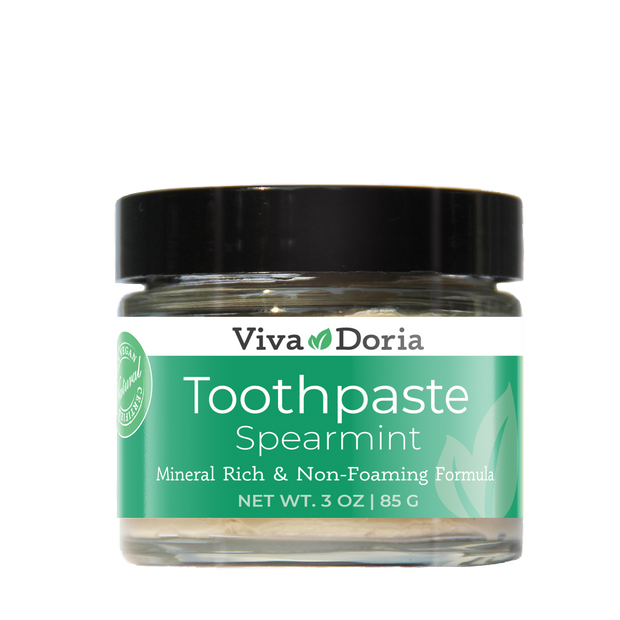 Viva Doria Spearmint Toothpaste in a 3 oz glass jar with a black lid and a green and white label, set against a plain white background.