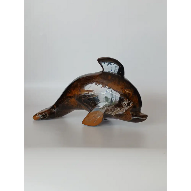 Assorted hand-carved animal figurines made from Blue Tiger’s Eye, Fluorite, and Tiger’s Eye crystals, each featuring unique colors and patterns, displayed on a white background.