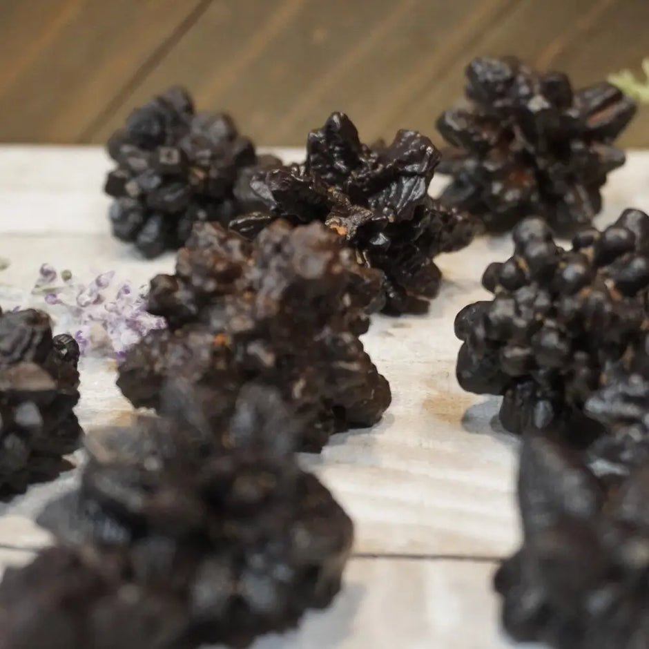 Crystalized Egyptian Prophecy Stone with intricate crystal formations and earthy tones, displayed on a white background.