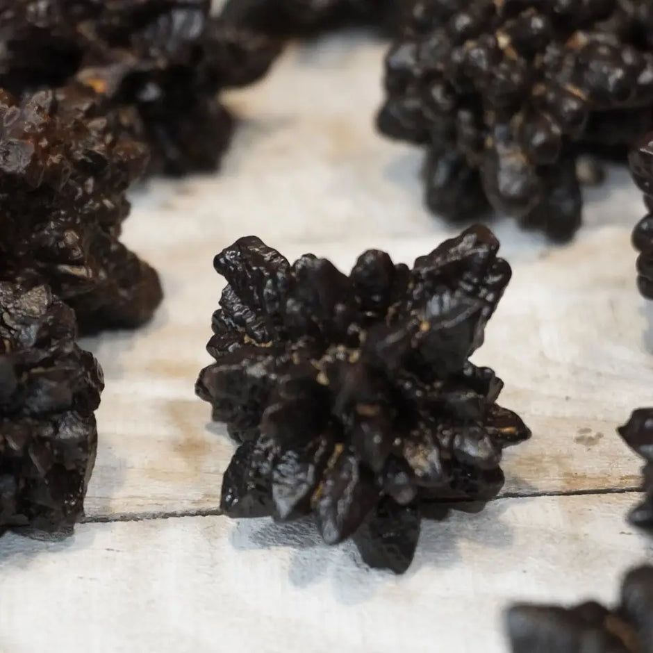 Crystalized Egyptian Prophecy Stone with intricate crystal formations and earthy tones, displayed on a white background.