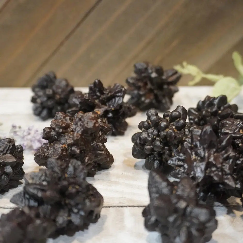 Crystalized Egyptian Prophecy Stone with intricate crystal formations and earthy tones, displayed on a white background.