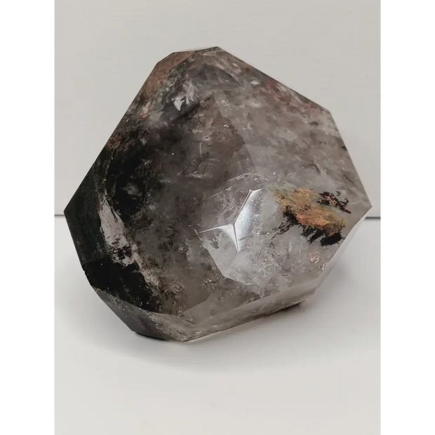 Faceted crystal on a white background