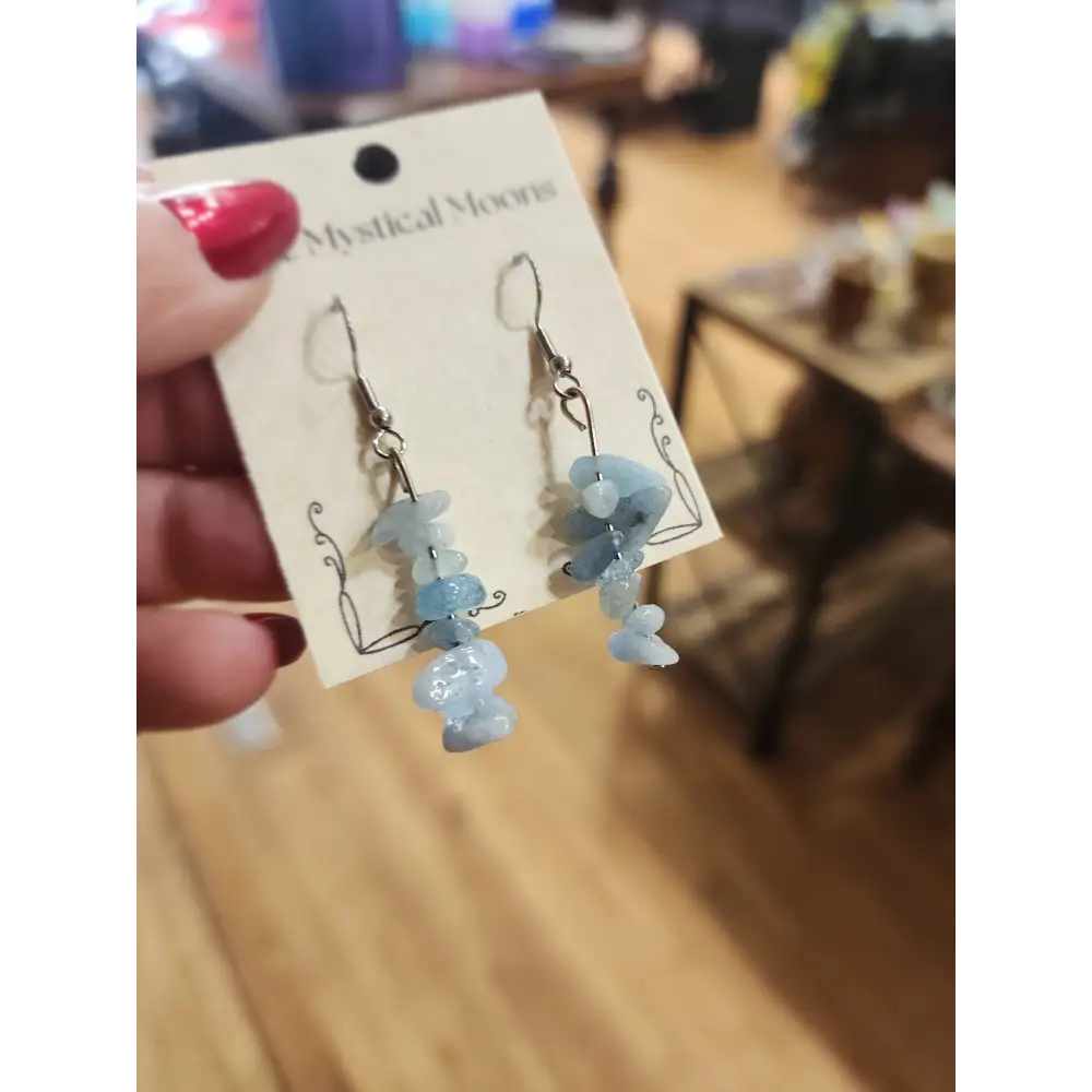 Assorted genuine stone chip earrings in a variety of colors and crystal types, displayed on a white background. Perfect for unique style and everyday crystal energy.