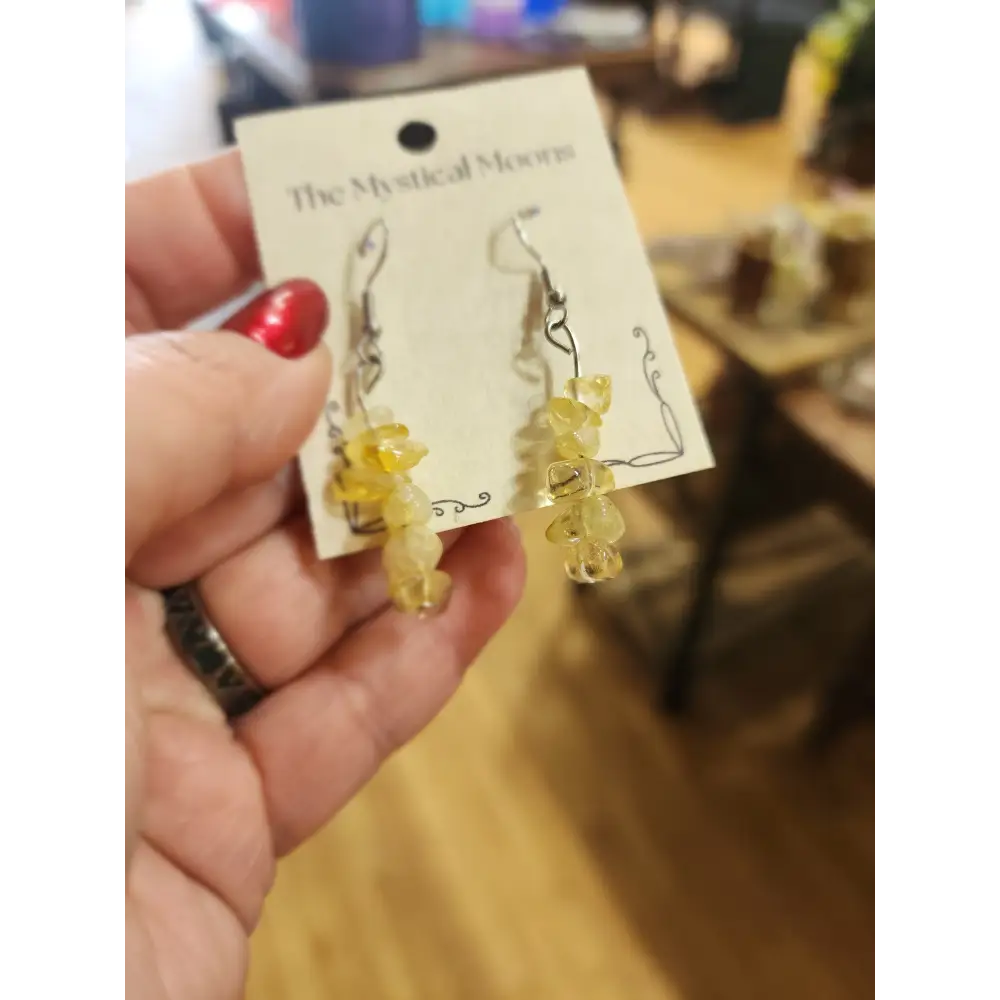 Assorted genuine stone chip earrings in a variety of colors and crystal types, displayed on a white background. Perfect for unique style and everyday crystal energy.