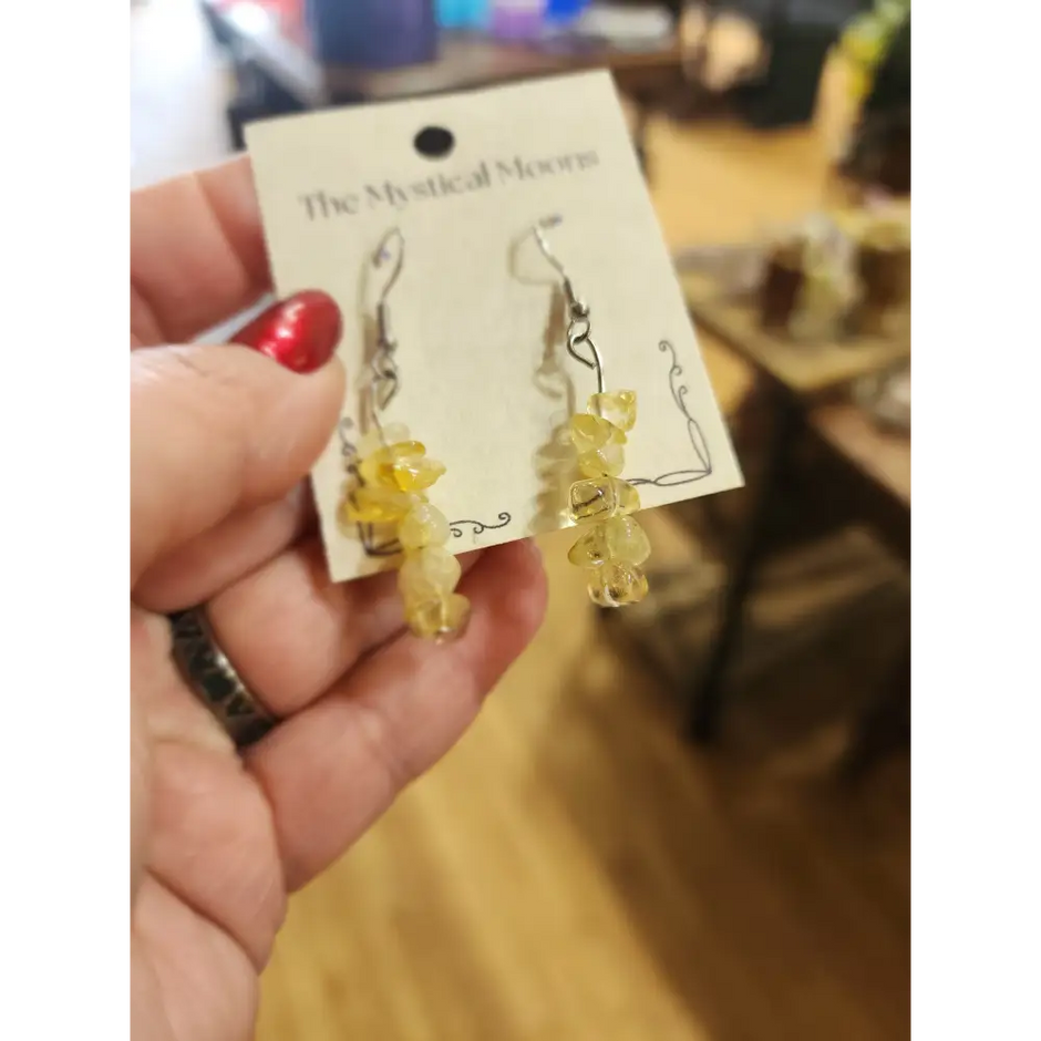 Assorted genuine stone chip earrings in a variety of colors and crystal types, displayed on a white background. Perfect for unique style and everyday crystal energy.