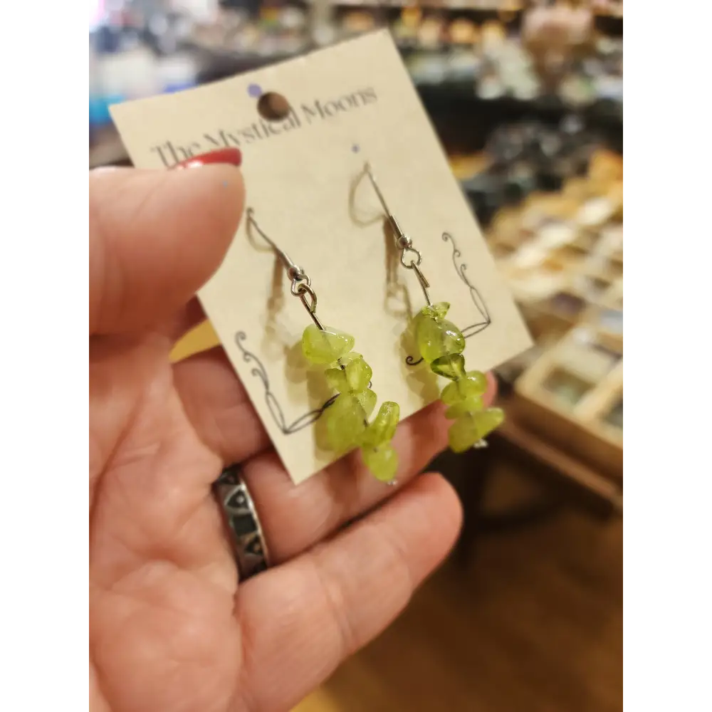 Assorted genuine stone chip earrings in a variety of colors and crystal types, displayed on a white background. Perfect for unique style and everyday crystal energy.
