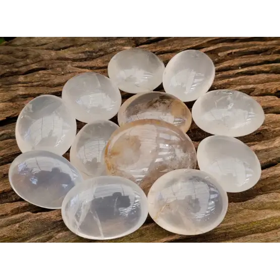 Hand-polished girasol quartz heart with a soft, milky translucence and gentle glow, displayed on a white background. Perfect for gentle clarity, emotional healing, and loving energy.