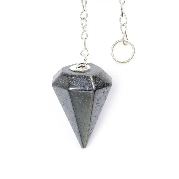 Gray crystal pendulum on a white background