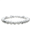 White marbled beaded bracelet on a light gray background