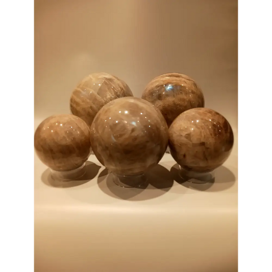 Moonstone with Sunstone sphere for harmony and empowerment