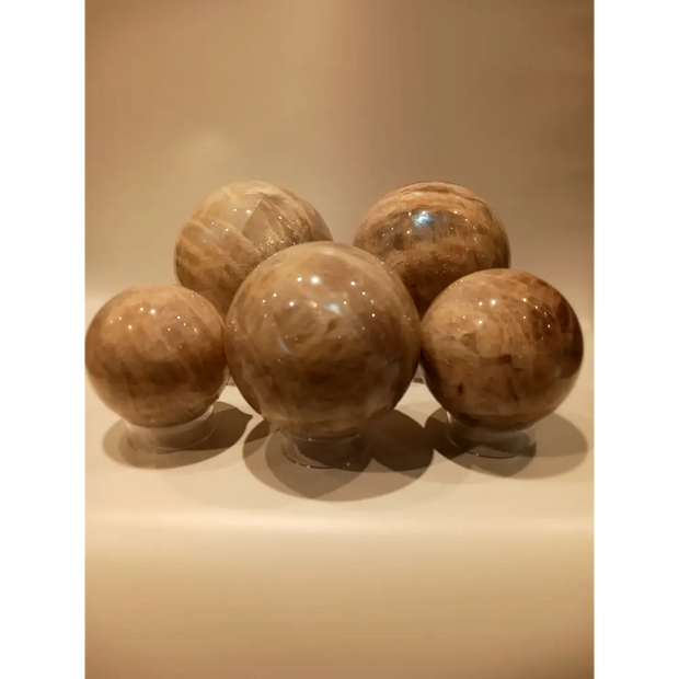 Moonstone with Sunstone sphere for harmony and empowerment