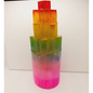 Rainbow selenite tiered tower, polished with a vibrant rainbow sheen and step-like design, displayed on a white background.