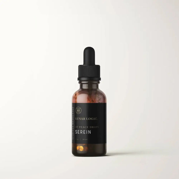 1oz glass bottle of SEREIN / At Peace Drops with glass pipette, displayed on a white background. Perfect for evening serenity, nervous system support, and restorative calm.