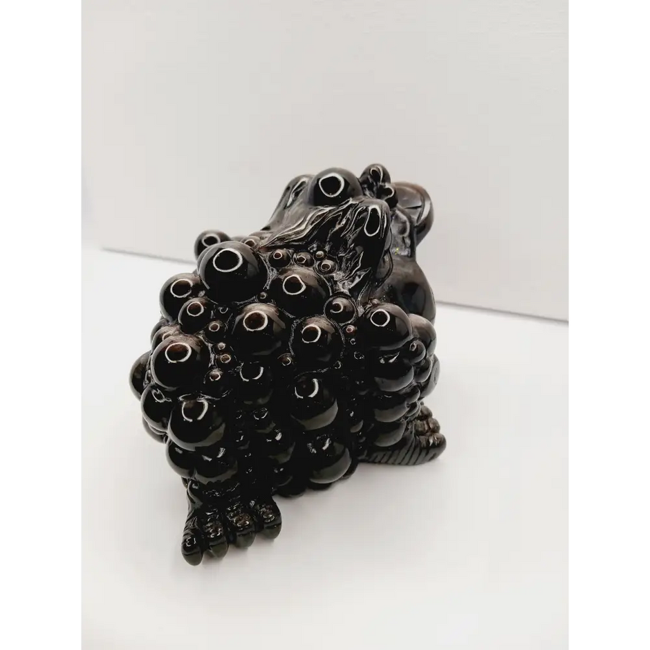 Silver sheen obsidian money toad, hand-carved with a reflective silver luster, measuring 5.5 inches, displayed on a white background.