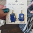 Sterling silver earrings featuring vibrant blue azurite stones, displayed on a white background. Perfect for insight, intuition, and vibrant energy.