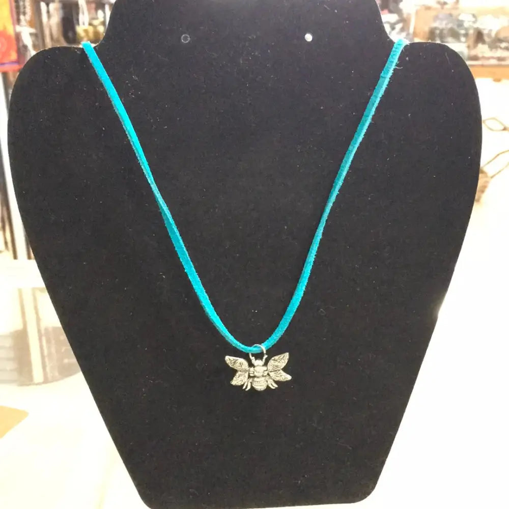 Sterling silver pendant featuring a detailed bumble bee, displayed on a white background. Perfect for joy, community, and personal power.