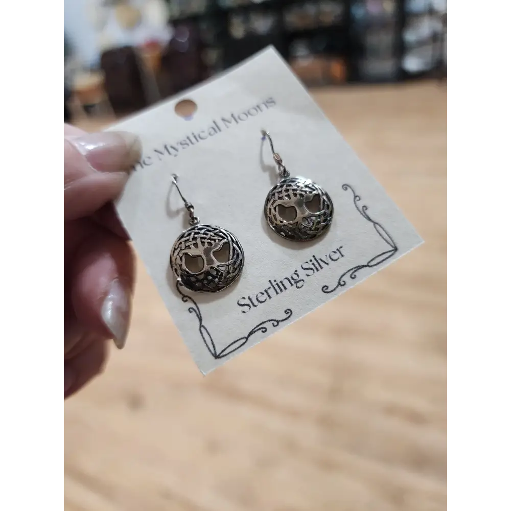 Sterling silver earrings featuring the Tree of Life intertwined with a Celtic knot, displayed on a white background. Perfect for wisdom, connection, and timeless Celtic style.