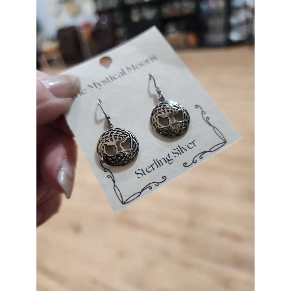 Sterling silver earrings featuring the Tree of Life intertwined with a Celtic knot, displayed on a white background. Perfect for wisdom, connection, and timeless Celtic style.