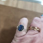 Assorted sterling silver rings featuring unique genuine gemstones in various shapes and colors, displayed on a white background. Perfect for crystal energy, personal style, and one-of-a-kind magic.