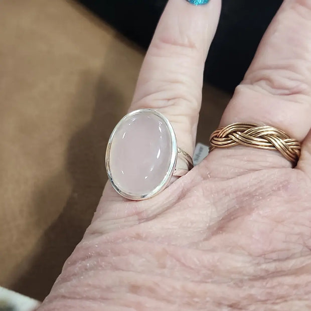 Assorted sterling silver rings featuring unique genuine gemstones in various shapes and colors, displayed on a white background. Perfect for crystal energy, personal style, and one-of-a-kind magic.