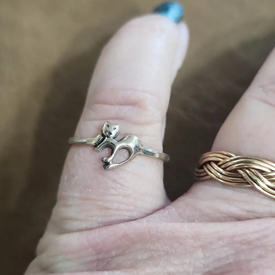 Assorted sterling silver rings featuring unique genuine gemstones in various shapes and colors, displayed on a white background. Perfect for crystal energy, personal style, and one-of-a-kind magic.