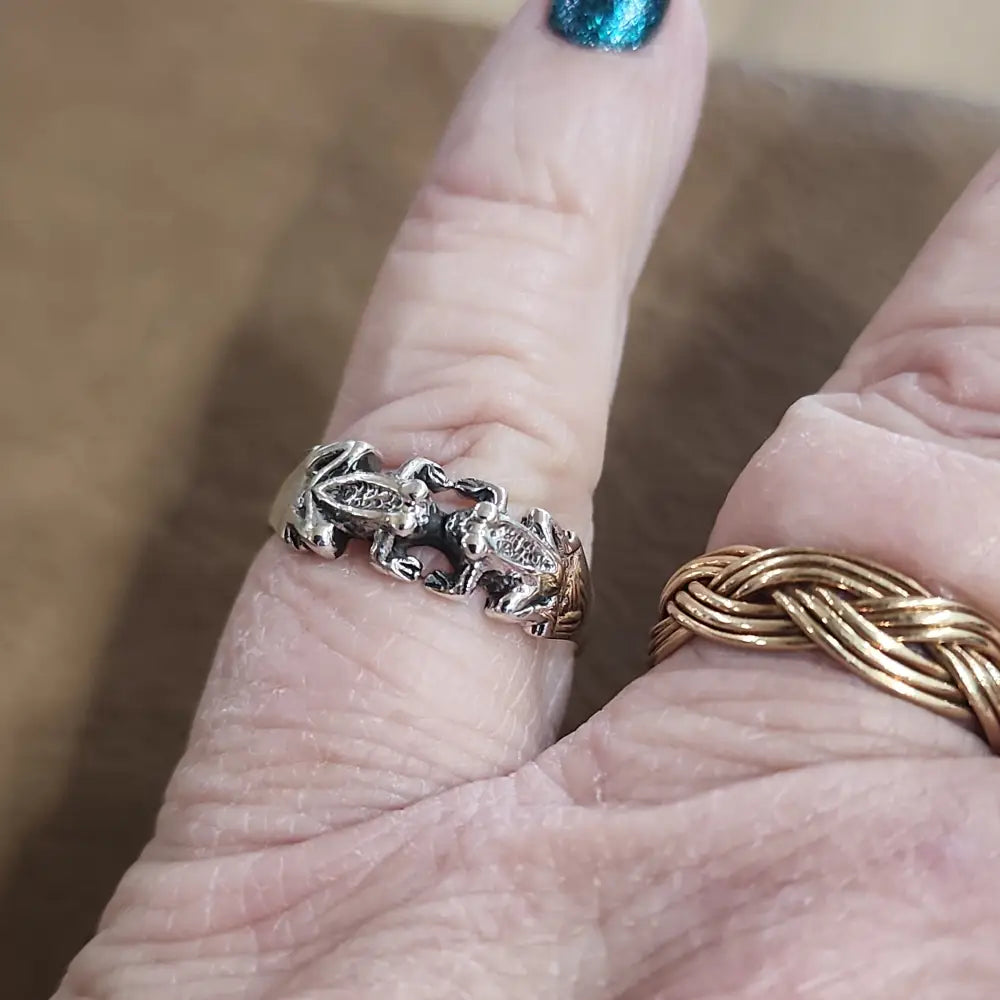 Assorted sterling silver rings featuring unique genuine gemstones in various shapes and colors, displayed on a white background. Perfect for crystal energy, personal style, and one-of-a-kind magic.