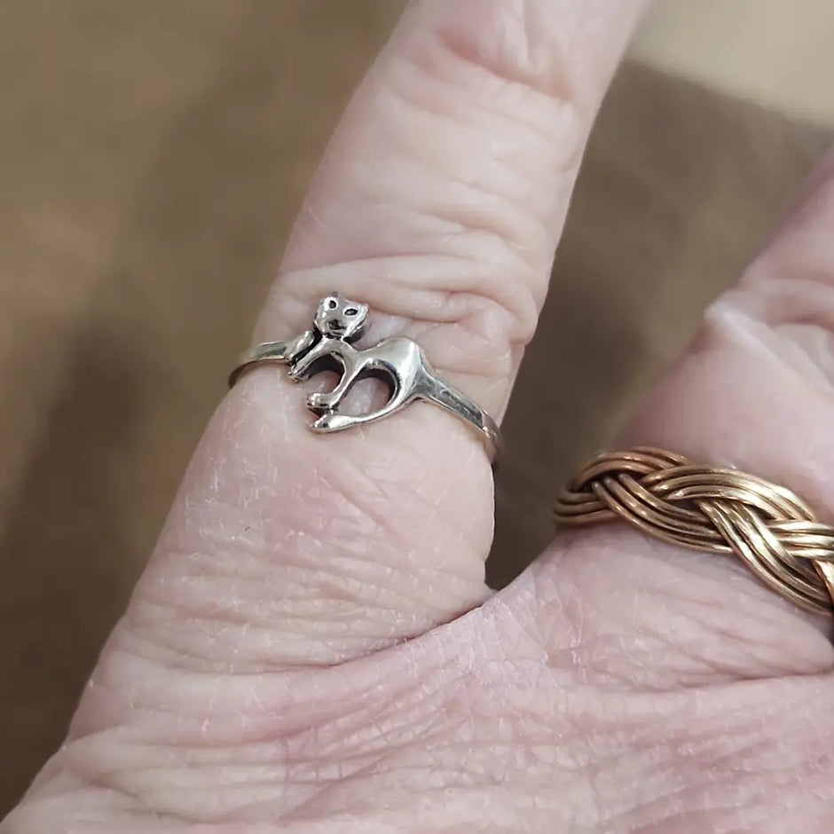 Assorted sterling silver rings featuring unique genuine gemstones in various shapes and colors, displayed on a white background. Perfect for crystal energy, personal style, and one-of-a-kind magic.