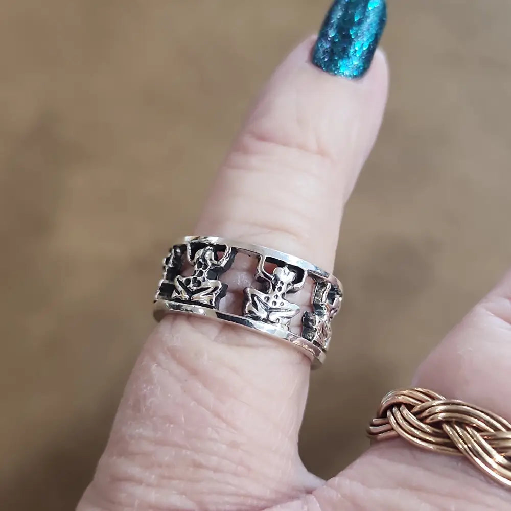 Assorted sterling silver rings featuring unique genuine gemstones in various shapes and colors, displayed on a white background. Perfect for crystal energy, personal style, and one-of-a-kind magic.