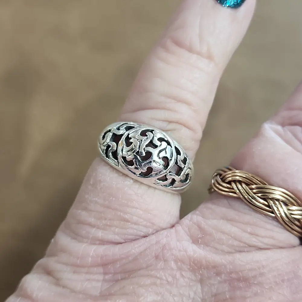 Assorted sterling silver rings featuring unique genuine gemstones in various shapes and colors, displayed on a white background. Perfect for crystal energy, personal style, and one-of-a-kind magic.